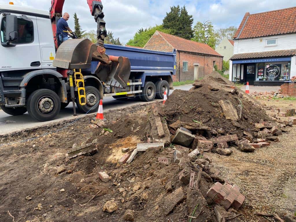 This is a photo of a dig out being carried out for the installation of a new tarmac driveway. Works being carried out by Sawston Driveways