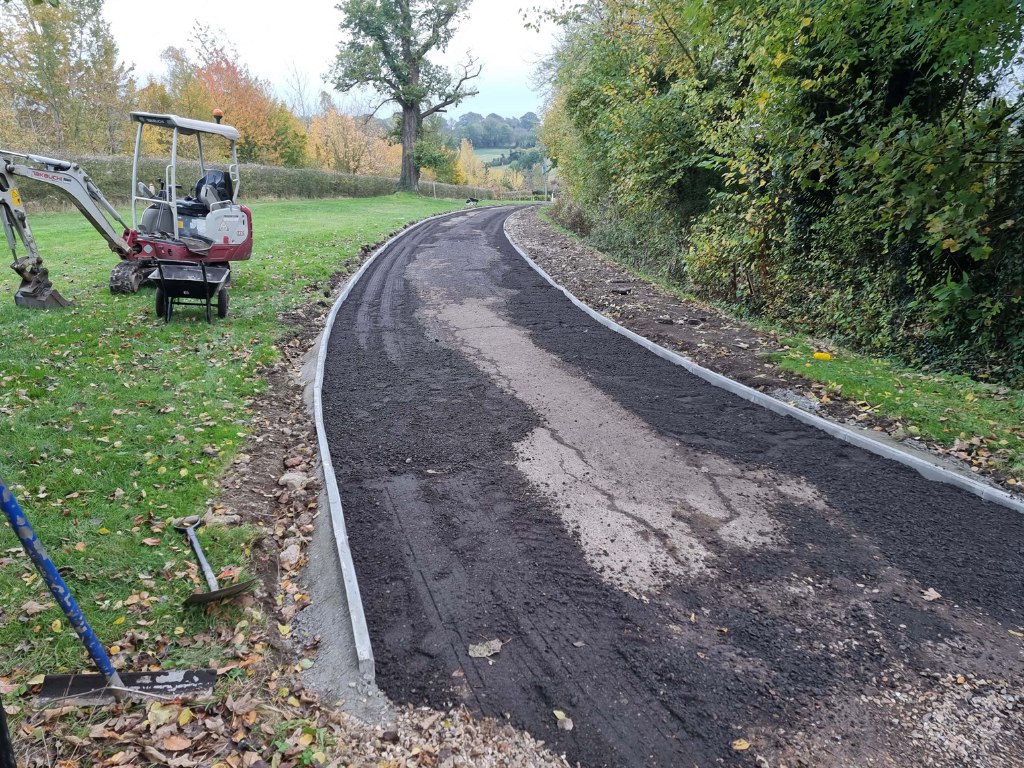 This is a large driveway which is in the process of having a tar and chip driveway installed on by Sawston Driveways