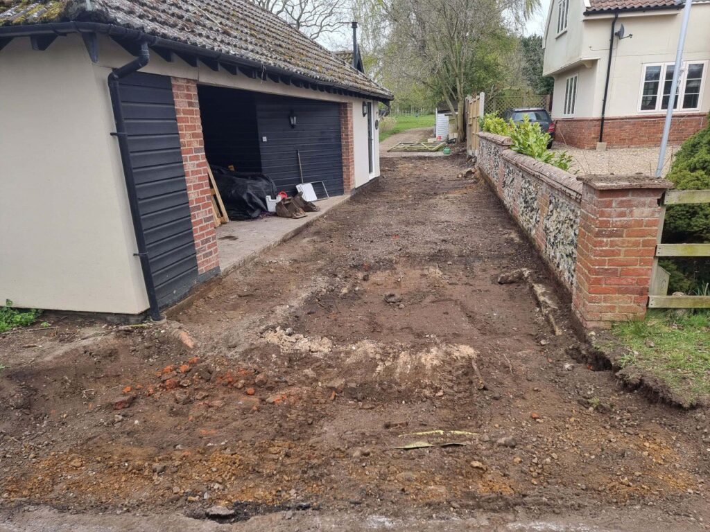 This is a tarmac driveway that is in the process of being dug out and installed by Sawston Driveways